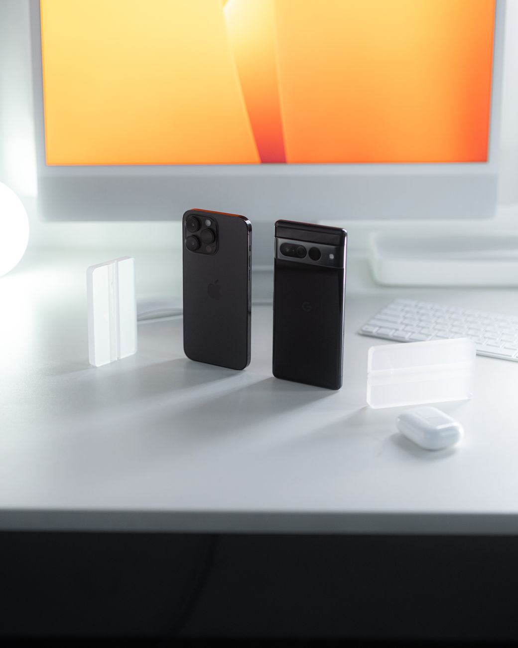 black smartphones standing on a desk