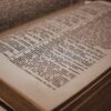 close up photo of pages of an old english spanish dictionary