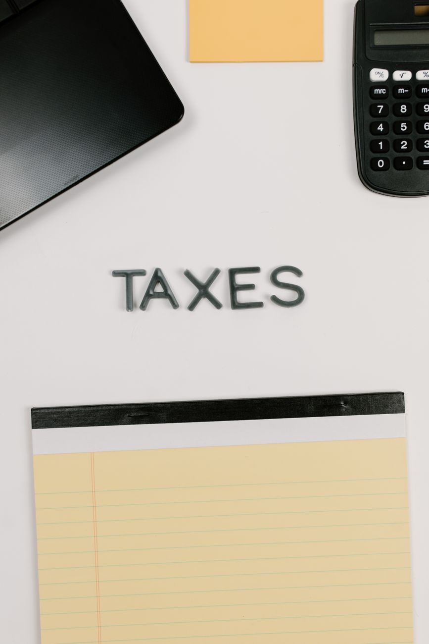 notepad and calculator on white background