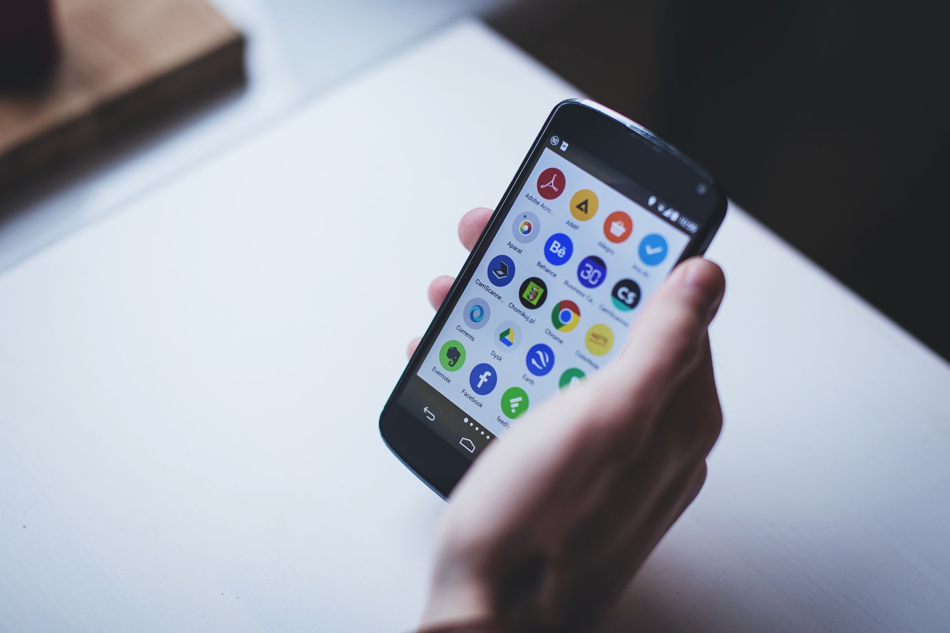 person holding black smartphone
